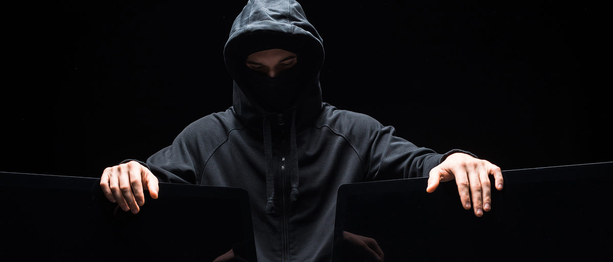 panoramic shot of hacker touching computer monitors isolated on black Schlagwort(e): computer,caucasian,protection,man,european,connection,technology, computer, caucasian, protection, man, european, connection, technology, dark, communication, touch, network, data, information, web, safety, crime, panorama, panoramic, online, system, virus, mask, gadget, hood, access, secure, cyber, use, privacy, hacker, hack, hacking, hooded, anonymous, one person, studio shot, young adult, isolated on black, computer monitors, internet security, cyber attack, digital device, gdpr