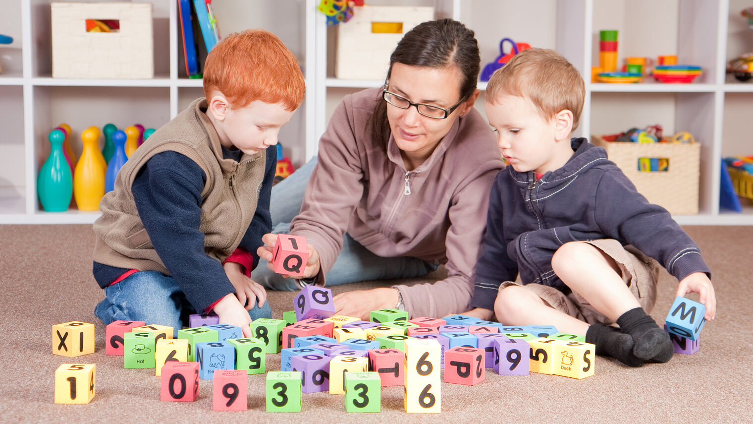 Mother playing blocks games with boys Schlagwort(e): babysitter, children, child, kid, kids, play, playing, game, block, blocks, build, building, tower, stack, stacking boy, boys, two, three, caucasian, fun, having, have, playroom, nursery, kindergarten, preschool, preschooler, preschoolers, girl, babysit, babysitting, babysitter, woman, mum, mom, mother, female, happy, family, brother, brothers, sibling, siblings, alphabet, letters, shelf, shelves, entertain, care, home, house, inside, babysitter, children, child, kid, kids, play, playing, game, block, blocks, build, building, tower, stack, boys, two, three, caucasian, fun, having, have, playroom, nursery, kindergarten, preschool, preschooler, preschoolers, girl, babysit, babysitting, woman, mum, mom, mother, female, happy, family, brother, brothers, sibling, siblings, alphabet, letters, shelf, shelves, entertain, care, home, house