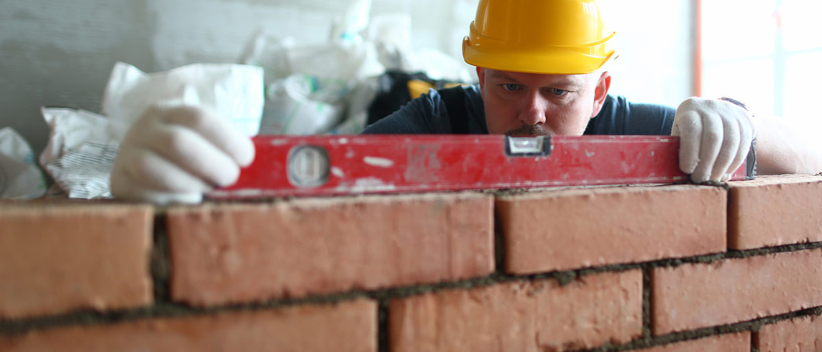 Portrait of hardworking male using level to stick to strict construction scale and put red bricks on concrete wall properly. Pedantic builder try to work right. Building concept Schlagwort(e): portrait, hardworking, stacker, man, builder, hardhat, male, use, level, stick, strict, construction, scale, put, red, bricks, concrete, wall, properly, try, work, right, building, concept, professional, skilled, bricklayer, focus, big, special, blocks, lay, unfinished, structure, materials, make, industry, site, engineer, brickwork, constructor, masonry, craftsman, job, architecture, measure, stonework, laborer, install, equipment, portrait, hardworking, stacker, man, builder, hardhat, male, use, level, stick, strict, construction, scale, put, red, bricks, concrete, wall, properly, try, work, right, building, concept, professional, skilled, bricklayer, focus, big, special, blocks, lay, unfinished, structure, materials, make, industry, site, engineer, brickwork, constructor, masonry, craftsman, job, architecture, measure, stonework, laborer, install, equipment