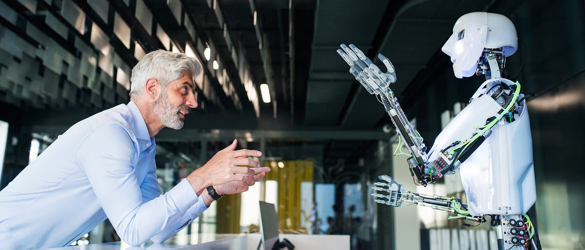 Mature businessman or a scientist with gray hair with a robot. Schlagwort(e): office, working, man, entrepreneur, job, professional, career, occupation, indoors, confident, beard, handsome, stylish, manager, smart, corporate, shirt, work, mature, 50s, gray hair, hair, workspace, workplace, interior, modern, smiling, blue, two, robots, robot, android, droid, futuristic, future, cyborg, happy, caucasian, white, male, technology, artificial, intelligence, laboratory, scientist, talking, teaching, copying, hands, gestures, office, working, man, entrepreneur, job, professional, career, occupation, indoors, confident, beard, handsome, stylish, manager, smart, corporate, shirt, work, mature, 50s, gray hair, hair, workspace, workplace, interior, modern, smiling, blue, two, robots, robot, android, droid, futuristic, future, cyborg, happy, caucasian, white, male, technology, artificial, intelligence, laboratory, scientist, talking, teaching, copying, hands, gestures