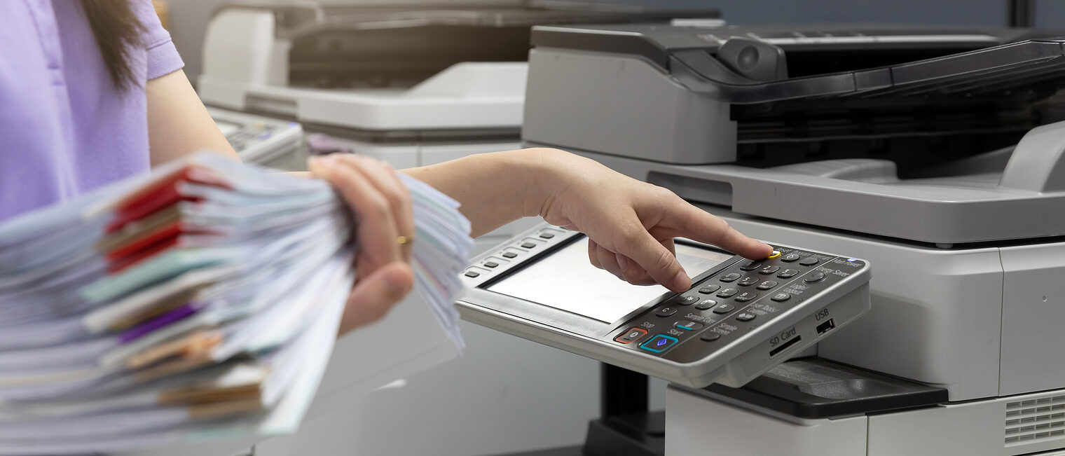 Bussinesswoman using copier machine to copy heap of paperwork in office. Schlagwort(e): printer, copier, scanner, document, office, scan, machine, paper, printer, copier, scanner, document, office, scan, machine, paper, fax, print, woman, hand, secretary, business, copying, paperwork, photocopier, work, photocopy, businesswoman, copy, equipment, inkjet, laser, technology, stack, overwork, heap, accounting, media, manage, management, many, network, digital, colorful, button, worker, assistant, computer, industry, job, labor, education, stock, workload, chaos, data, busy, organization