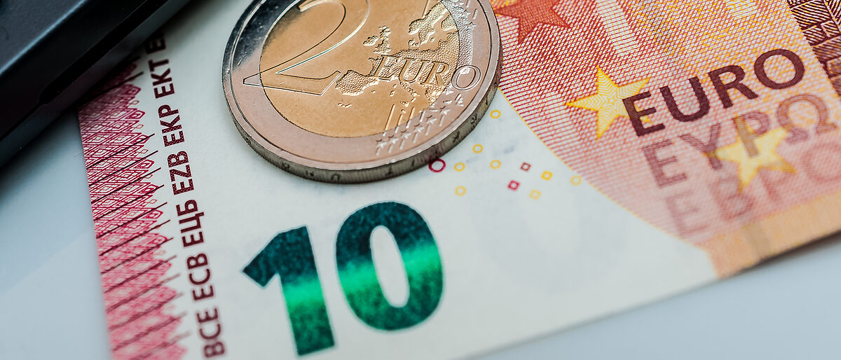 Mindestlohn 12 Euro, Geld, Gehalt, Münzen. Bild: Stockfotos-MG / stcok.adobe.com