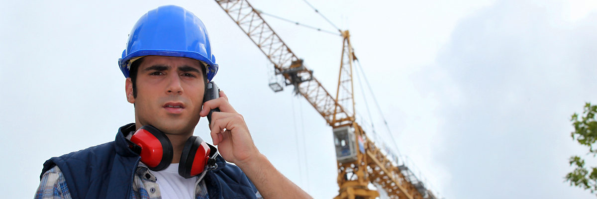 A foreman on his phone onsite. Schlagwort(e): _#CR_3003014, _#CC_1020010, _#M_DiPalma_Thomas_290710, adult, builder, building, business, cell, cellular, communicating, communication, corporate, crane, discuss, discussing, earplugs, engineer, foreman, handsome, hat, house, industrial, industry, jacket, male, man, manager, mobile, outdoor, pensive, person, phone, professional, safe, safety, site, sky, smile, speak, supervising, supervisor, talk, think, thoughtful, uniform, urban, vest, work, worker, workforce, adult, builder, building, business, cell, cellular, communicating, communication, corporate, crane, discuss, discussing, earplugs, engineer, foreman, handsome, hat, house, industrial, industry, jacket, male, man, manager, mobile, outdoor, pensive, person, phone, professional, safe, safety, site, sky, smile, speak, supervising, supervisor, talk, think, thoughtful, uniform, urban, vest, work, worker, workforce