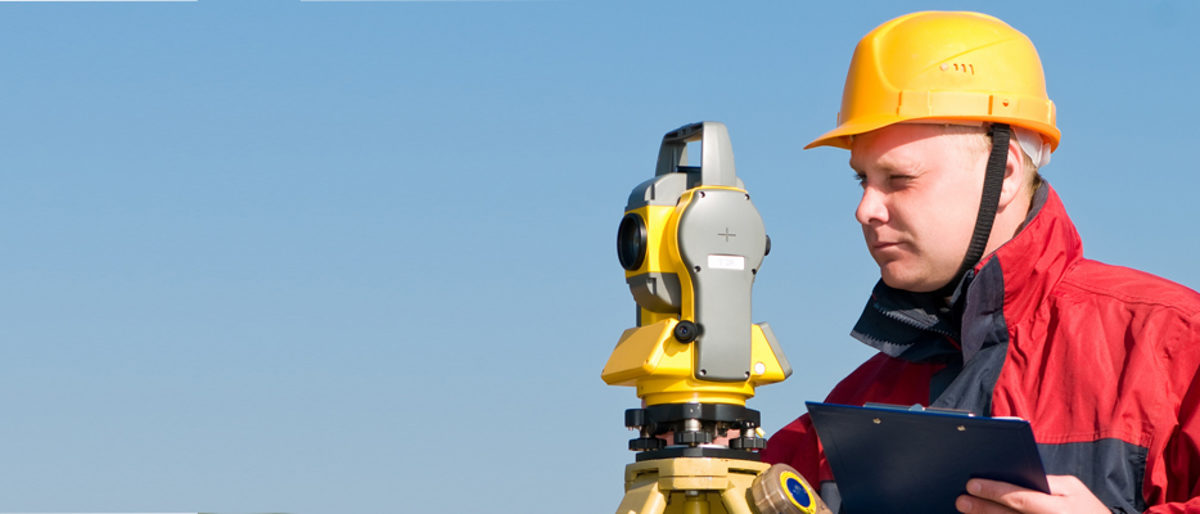 Surveyor worker making measurement in a field with theodolite total station equipment Schlagwort(e): worker, engineer, survey instrument, optical equipment, total station, positioning, measuring, construction equipment, theodolite, Tacheometer, transit, exact position, geodesy, topographic, points, ground, surveying, survey, surveyor, tool, instrument, measurement, horizontal, angles, tripod, level, land, inspection, Looking, checking, Construction site, building, industry, engineering, workplace, precision instrument, technology