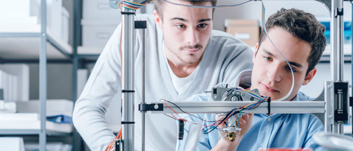Young students researchers using an innovative 3D printer in the laboratory, engineering and prototyping concept Schlagwort(e): 3D, 3D Print, 3D Printer, 3D Printing, Academic, College, Components, Creative, Creativity, Design, Education, Electrical, Electronic, Engineer, Engineering, Industry, Innovation, Invention, Lab, Laboratory, Learning, Manufacturing, Material, Mechanical engineer, Men, Precision, Product, Project, Prototyping, Research, School, Science, Scientist, Student, Studying, Tech, Technician, Technology, Test, Testing, Tool, Two people, University, Wires, Working, Young