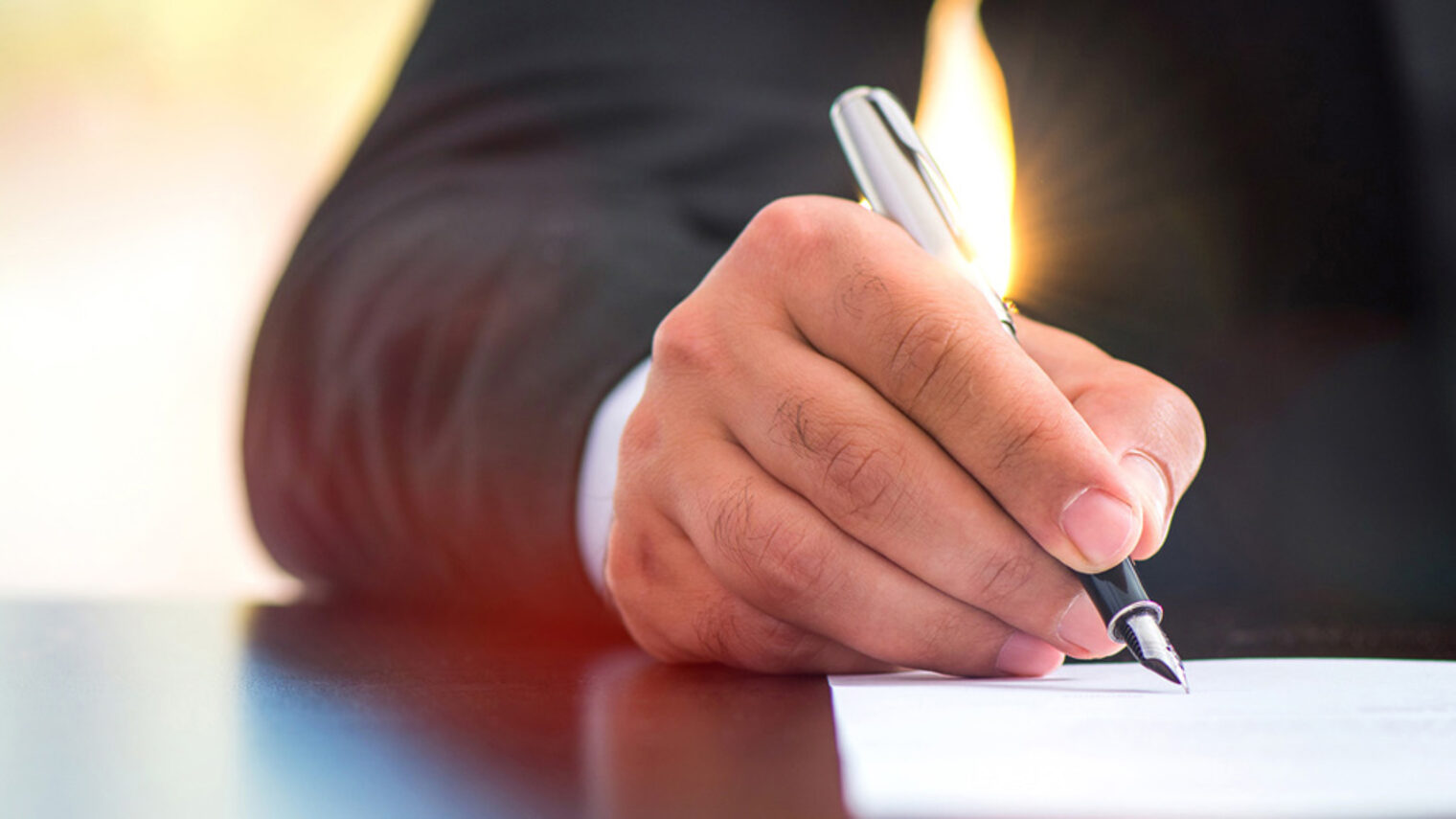 Businessman Signing An Official Document Schlagwort(e): signing, contract, papers, document, business, sign, signature, businessman, writing, write, decision, agreement, paper, official, formal, paperwork, pen, fountain pen, bond, certificate, commitment, concept, documentation, finance, financial, insurance, guarantee, lawyer, legal, legacy, man, male, mortgage, notary, pact, pledge, testament, background, corporate, desk, start, new, risk