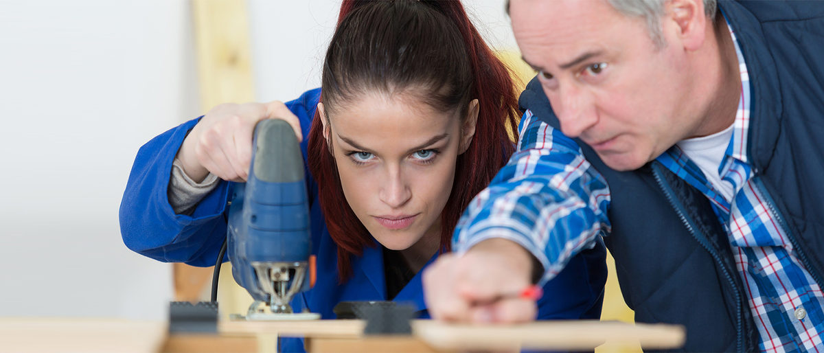 woman as carpenter during apprenticeship lesson Schlagwort(e): _#C_10105, _#M_alpbig_jeff_010316, _#M_alprau_lea_010316, learning, to, use, wood, board, workshop, ear, work, lesson, learn, saw, business, trade, labor, joiner, craftsman, young, internship, protection, processing, blue, collar, training, operation, construction, worker, apprentice, fixing, woodworking, woman, carpenter, trainee, intern, caucasian, apprenticeship, goggles, woodworker, female, working, profession, learning, to, use, wood, board, workshop, ear, work, lesson, learn, saw, business, trade, labor, joiner, craftsman, young, internship, protection, processing, blue, collar, training, operation, construction, worker, apprentice, fixing, woodworking, woman, carpenter, trainee, intern, caucasian, apprenticeship, goggles, woodworker, female, working, profession