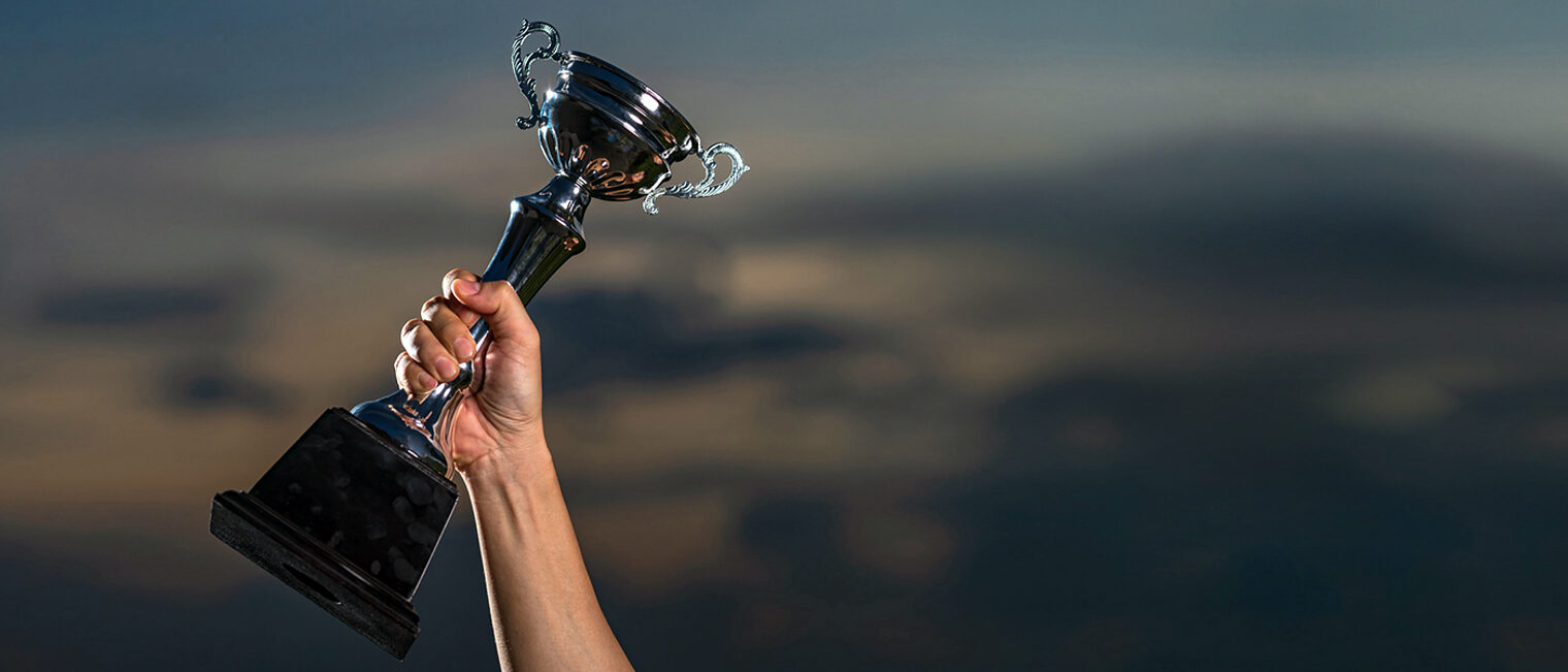 a man holding up a trophy cup on against cloudy twilight sky background, The winner and successful concept Schlagwort(e): trust, first place, trophycup, teamwork, trophy cup, photography, cloudscape, achieve, championship, 1st, background, leader, concept, metal, golden, gold, best, successful, reward, event, achievement, competition, award, trophy, victory, celebration, success, cup, business, ceremony, sport, hand, first, motivation, holding, men, place, up, inspiration, sky, winning, athlete, ideas, blue, human, prize, leadership, win, winner, champion, trust, first place, trophycup, teamwork, trophy cup, photography, cloudscape, achieve, championship, 1st, background, leader, concept, metal, golden, gold, best, successful, reward, event, achievement, competition, award, trophy, victory, celebration, success, cup, business, ceremony, sport, hand, first, motivation, holding, men, place, up, inspiration, sky, winning, athlete, ideas, blue, human, prize, leadership, win, winner, champion