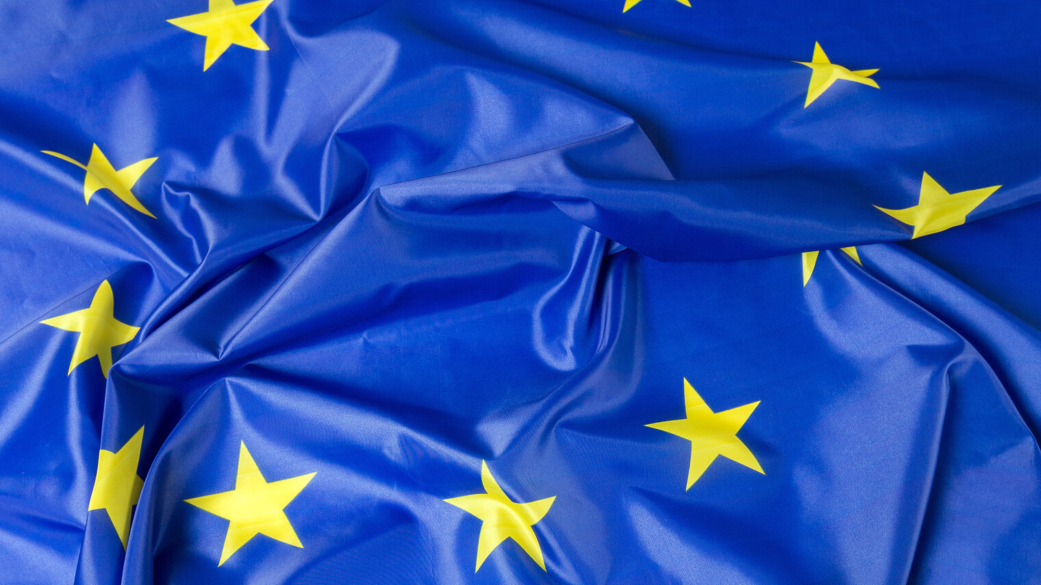 European Union EU Flag Schlagwort(e): eu, flag, fabric, silky, cloth, european, yellow, silk, glossy, star, drapery, wave, union, texture, blue, euro, background, europe, textile